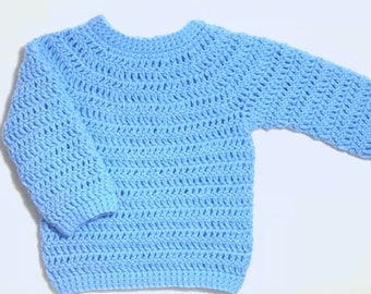 May include: A light blue crocheted sweater with long sleeves.