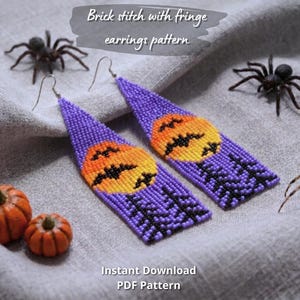 May include: A pair of long, triangular beaded earrings featuring a brick stitch pattern of a yellow and orange full moon, black silhouettes of bats, and dark pine trees against a purple sky, with silver-toned earring hooks attached.