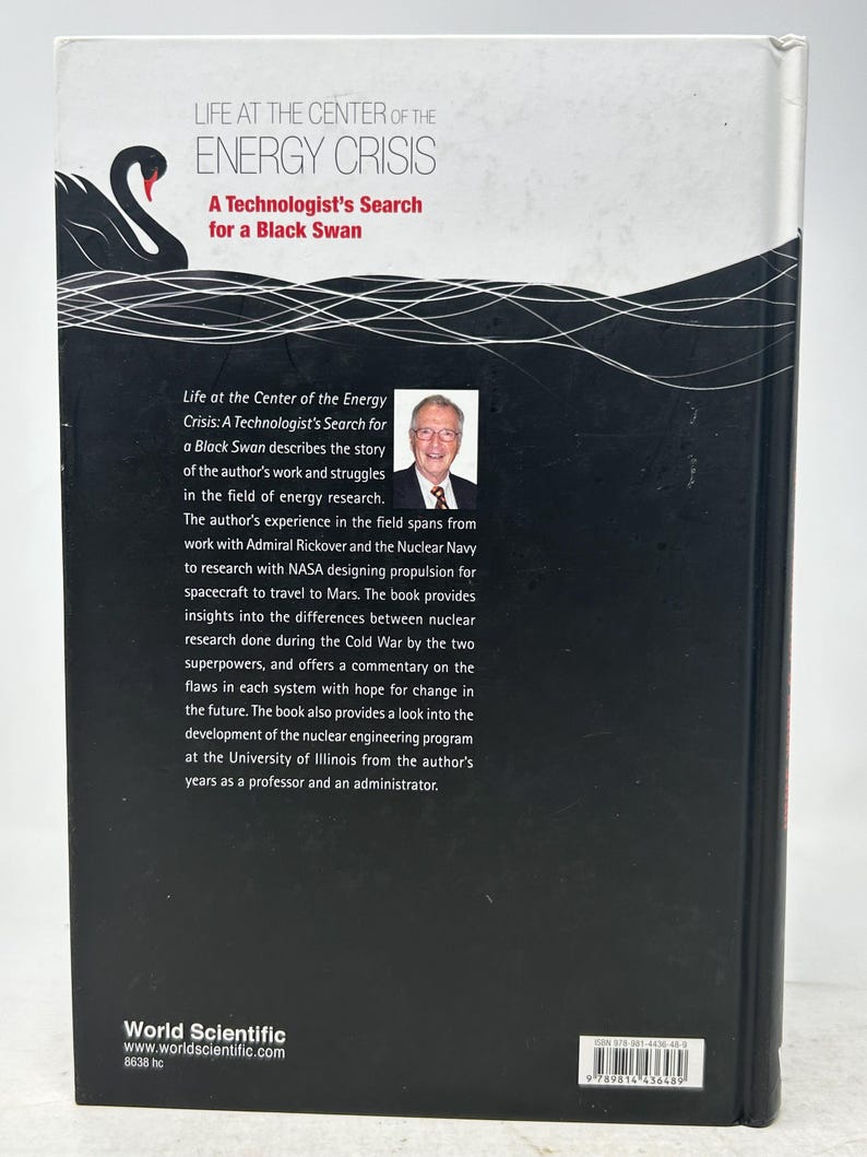 May include: The back cover of a book titled "Life at the Center of the Energy Crisis: A Technologist's Search for a Black Swan." The cover is black with white text and a graphic of a black swan. The book is published by World Scientific.