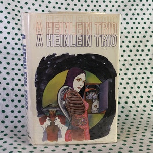A Heinlein Trio by Robert A. Heinlein Hardcover