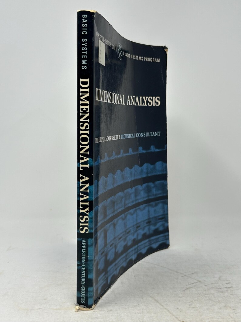 May include: A hardcover book titled "DIMENSIONAL ANALYSIS" by Philippe LeCorbeiller. The book has a dark blue cover with white text and a patterned design. The spine reads "BASIC SYSTEMS DIMENSIONAL ANALYSIS APPLETON-CENTURY-CROFTS".