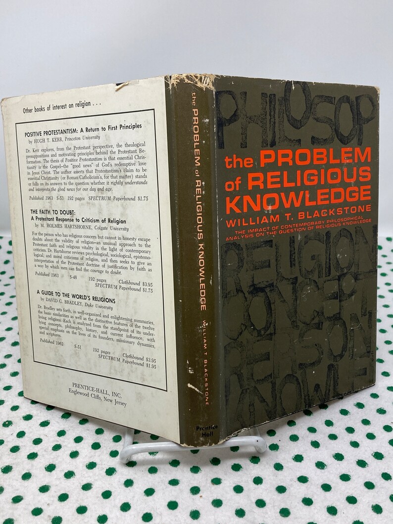 May include: A green book titled "The Problem of Religious Knowledge" by William T. Blackstone. The book cover features a large, stylised word "RELIGION" in white letters.
