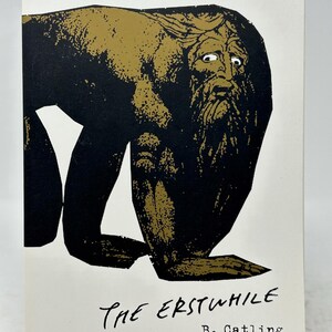 May include: A book cover featuring a gold and black illustration of a creature with a long beard and worried expression. The title "THE ERSTWHILE" is below the image, with the author's name and a quote from Alan Moore at the top.