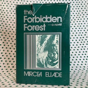 May include: A green book cover with the title "The Forbidden Forest - a novel" in white text. The author's name, "Mircea Eliade", is printed in white text at the bottom of the cover. The cover features a black and white image of a forest.