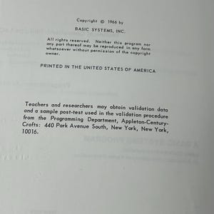 May include: A printed page with text from a book. The text includes copyright information from 1966 by Basic Systems, Inc., and details about reproduction rights. The page is printed in the United States of America.