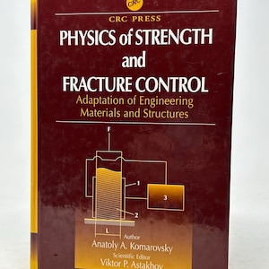 May include: A hardcover book titled "PHYSICS of STRENGTH and FRACTURE CONTROL" by Anatoly A. Komarovsky. The book has a maroon cover with yellow accents and a diagram. The CRC Press logo is visible.