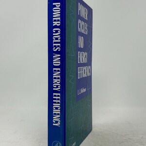 May include: A hardcover book titled "Power Cycles and Energy Efficiency" by E.J. Hoffman. The book has a blue spine with white text and a green cover with white text. The publisher is Academic Press.