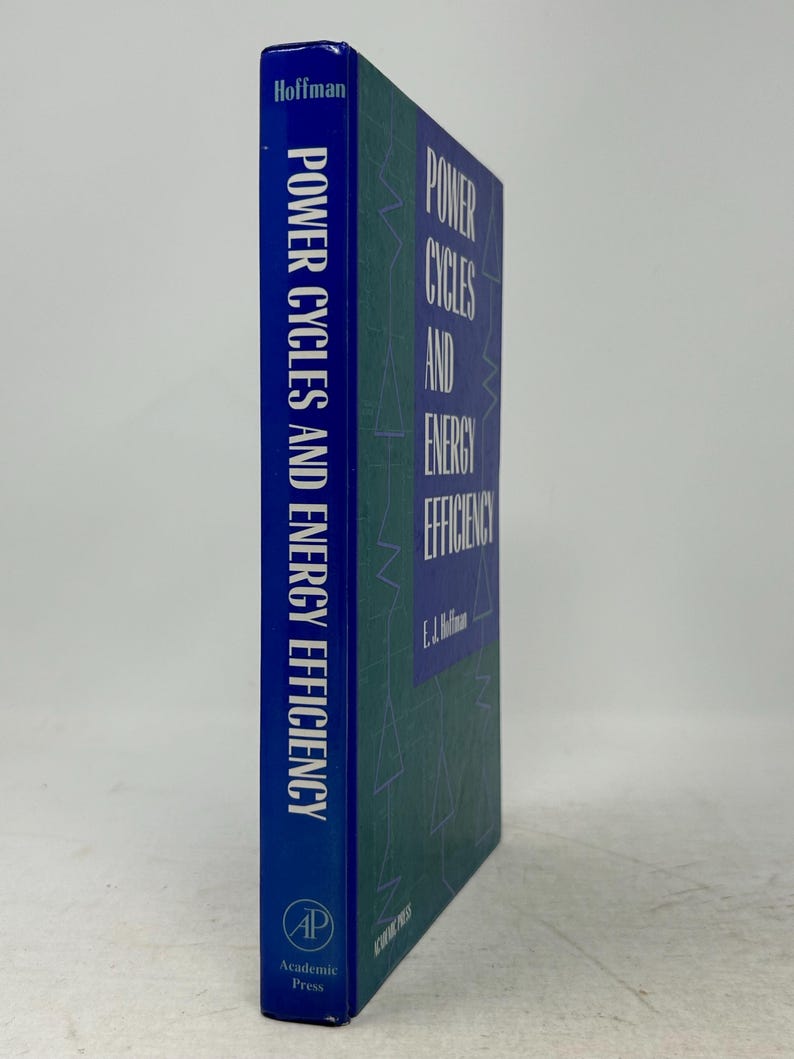 May include: A hardcover book titled "Power Cycles and Energy Efficiency" by E.J. Hoffman. The book has a blue spine with white text and a green cover with white text. The publisher is Academic Press.