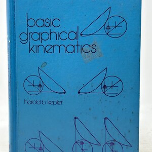 May include: A blue book titled "basic graphical kinematics" with the author's name, Harold B. Kepler, printed below the title. The cover features geometric diagrams in blue. The book's spine is visible on the left side.