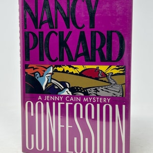 May include: A hardback book titled "Confession" by Nancy Pickard. The cover is a vibrant magenta with the author's name in large black letters. The book's cover art features a stylized illustration with a figure in blue and red.