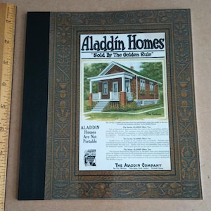 May include: A vintage brochure for Aladdin Homes, featuring a photo of a small, brown house with a porch and a caption that reads "Sold By The Golden Rule". The brochure also includes text about the benefits of building an Aladdin home.