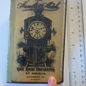 O Relógio Hamilton (1912) O Cronometrista Ferroviário da América, Catálogo de Amostras Comerciais, guia de referência para colecionadores de relógios de bolso antigos