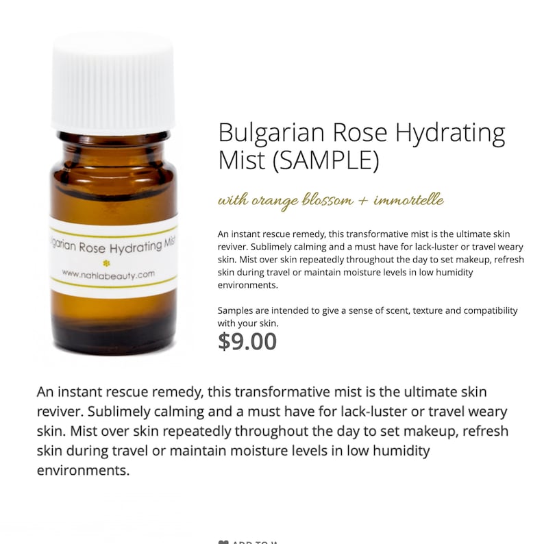 May include: A small, clear glass bottle with a brown liquid inside. The bottle is labeled "Bulgarian Rose Hydrating Mist (SAMPLE)" with "orange blossom + immortelle" printed below. The bottle is sitting on a white background.