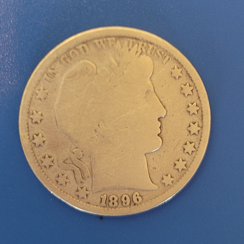 The one pictured is the one sold. Good condition 1896 Barber Half Dollar silver coin for the established collector