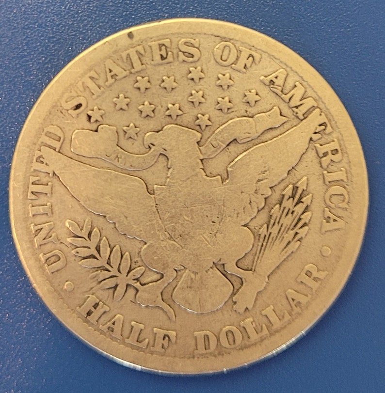 The one pictured is the one sold. Good condition 1896 Barber Half Dollar silver coin for the established collector
