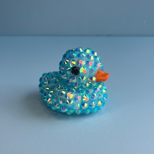 PATITO DE GOMA AZUL TURQUESA CON ESTRELLAS DE RAYOS - Regalo para baby shower - Decoración con forma de pato brillante - Pato de crucero - Regalo de Pascua - Pato Jeep - Pato brillante