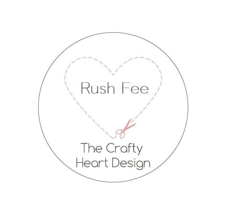 May include: A white circle with a dashed line heart shape and the text "Rush Fee" inside. A pair of pink scissors cuts through the heart shape. Below the heart is the text "The Crafty Heart Design".