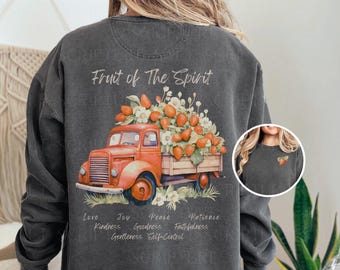 May include: A grey sweatshirt with a vintage look features a red truck filled with strawberries and the text "Fruit of the Spirit". Below the truck are the words "Love, Joy, Peace, Patience, Kindness, Goodness, Faithfulness, Gentleness, Self-Control".