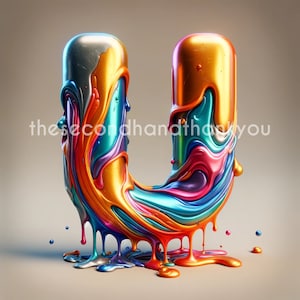 May include: A colorful, metallic letter U made of dripping paint. The paint is a mix of silver, gold, blue, green, red, orange, and purple. The letter is standing on a light brown surface.