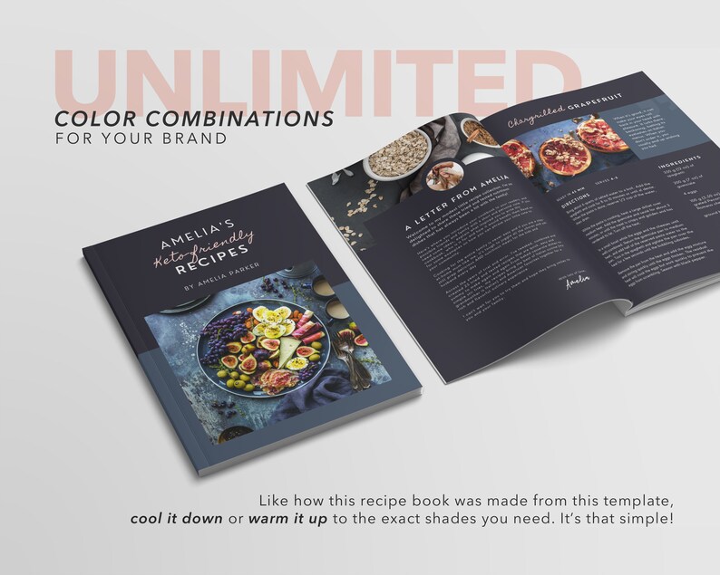 May include: A closed recipe book with a blue cover and a photo of a bowl of fruit on the front. The title of the book is "Amelia's Keto-friendly Recipes" by Amelia Parker. The book is open to a page with a recipe for "Char-grilled Grapefruit".