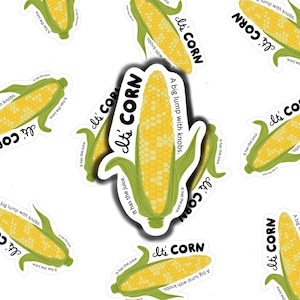 May include: A sticker featuring a cartoon corn cob with the text "It's Corn" and "A big lump with knobs. It has the juice."