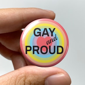 LGBTQ &quot;Gay and proud&quot; Pin-back Button | Lesbian Proud Gay Pride Pin Rainbow Bisexual Trans Queer Nonbinary Sapphic Coming Out WLW Meme Text