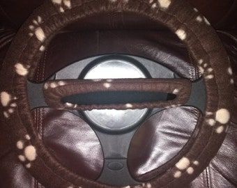 Set pootafdrukken (bruin en bruin) fleece stuurwiel en achteruitkijkspiegel