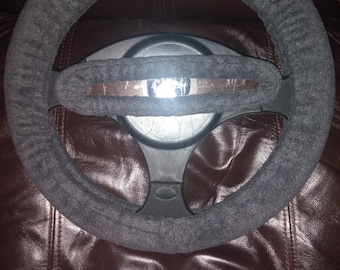 Set van Antracietgrijs, massief fleece stuurwiel en achteruitkijkspiegel.