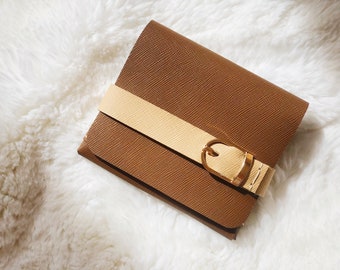 Cartera hecha a mano de cuero genuino