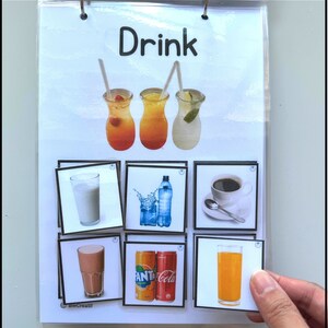 May include: A set of flashcards with the word "Drink" at the top. The flashcards show different types of drinks, including milk, water, coffee, chocolate milk, soda, and orange juice.