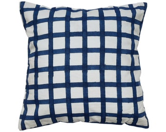 May include: A white pillow with a blue and white checkered pattern. The pillow is made of a soft, comfortable fabric and is perfect for adding a touch of style to any room.
