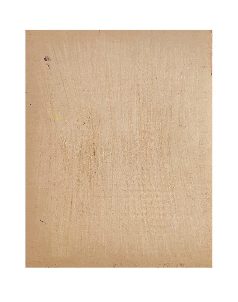 May include: A rectangular piece of light brown fiberboard with a textured surface. The material displays vertical brush-like streaks across its face, with a few small, scattered dark and yellow spots visible on the left side of the board.