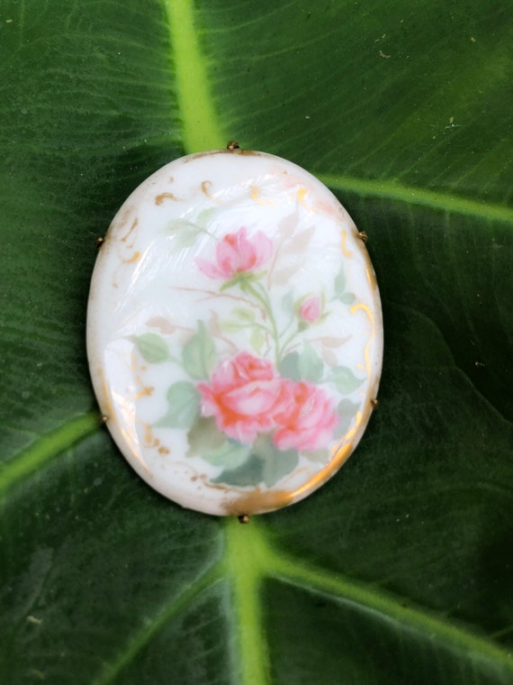 Vintage porcelain handpainted pink rose brooch.