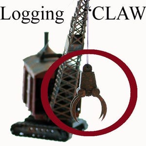 May include: A detailed model of a logging crane with the text "Logging 'CLAW'" at the top. The crane is brown and rusty, with a red circle highlighting the claw. The claw is a dark brown color.