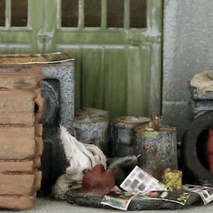 N Scale Building Wall Junk Pile with scattered garbage Finished