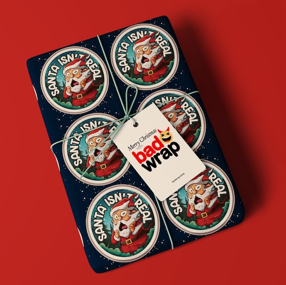 Santa Isn't Real funny Christmas wrapping paper by Bad Wrap