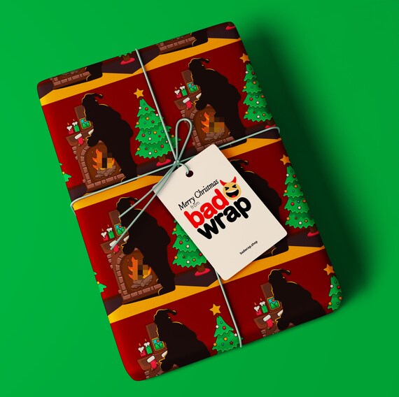 Naughty Santa silhouette adult Christmas wrapping paper by Bad Wrap