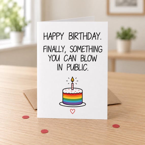 Blow in Public rainbow-cake birthday card in a lifestyle mock-up