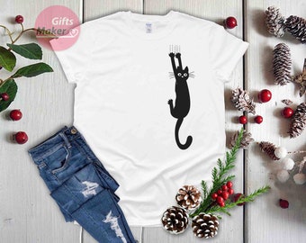 Maglietta gatto appesa, camicia gatto di Natale, camicie per gatti divertenti, camicia per gattini, top amante gatto, regalo di Natale per l'amico.