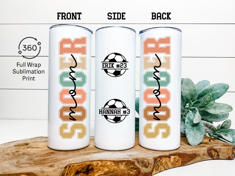 May include: White tumbler with a full wrap sublimation print of the word "Soccer" in colorful letters. The side of the tumbler features a soccer ball with the text "Erik #23" and another soccer ball with the text "Hannah #3".