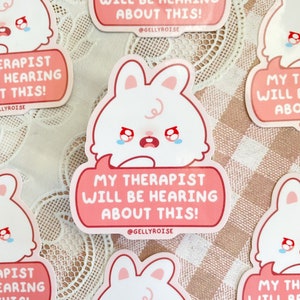 cute, white, crying bunny saying "My therapist will be hearing about this!" pink sticker