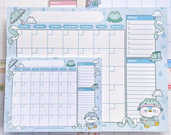 Calendario de escritorio mensual y anual de pingüinos para días lluviosos, hecho a mano, de 8,5 x 11 pulgadas, con lindas ranas kawaii, planificador estético, bloc de notas, papelería, trabajo y escuela.