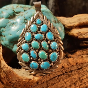 Stort turkost klusterhänge, Navajo, gammal bonde, 16 turkosa stenar, 925 sterlingsilver, ca 25,6 g
