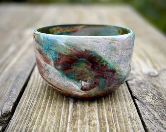 A Handmade Raku Fired White Crackle Glaze, Metallic Green & Copper Ceramic Pottery Decorative Dimple Bowl/Vessel ~ 12cm x 8cm