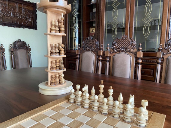 Medieval style chess pieces with a castle