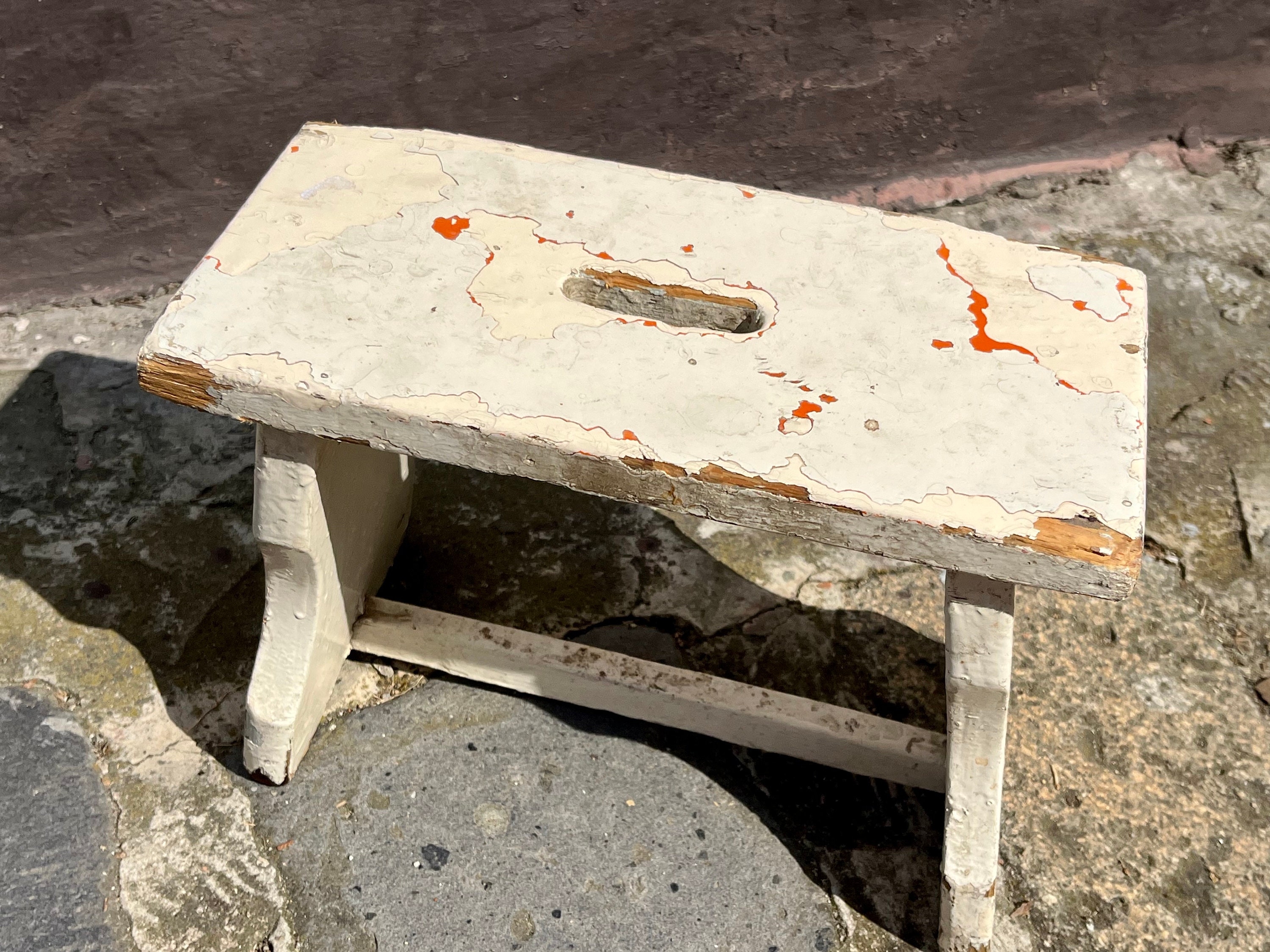 Antique vintage small wooden creamy white painted very old folk stool, peasant furniture, probably hand made, around 1930, tapped wood