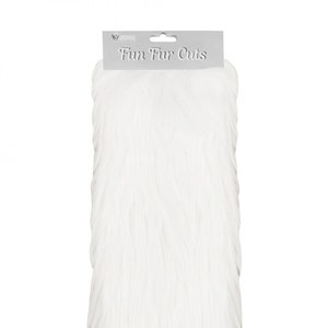 May include: A bundle of white faux fur with a textured, shaggy appearance. The product is packaged with a gray header card that reads "Fun Fur Cuts". The fur appears soft and is likely intended for crafting or costume making.