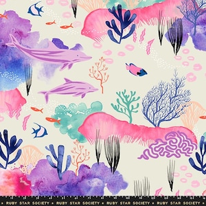 May include: A whimsical watercolor pattern featuring pink, purple, and blue coral, dolphins, and fish on a cream background. The design is perfect for fabric, wallpaper, or home decor.