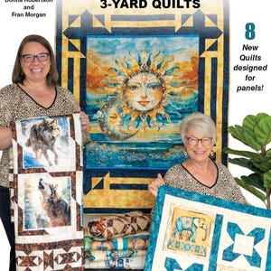 May include: The cover of a quilting book titled "Panel Perfect" with the text "3-Yard Quilts." Two women hold up quilts featuring wolf and elephant designs. The book cover features a sun and moon design.