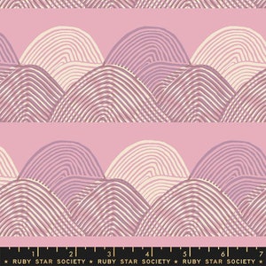 May include: A pink fabric with a repeating pattern of stylized hills in shades of pink, cream, and brown. The hills are made up of curved lines that create a striped effect. The fabric has a subtle sheen and a soft hand.